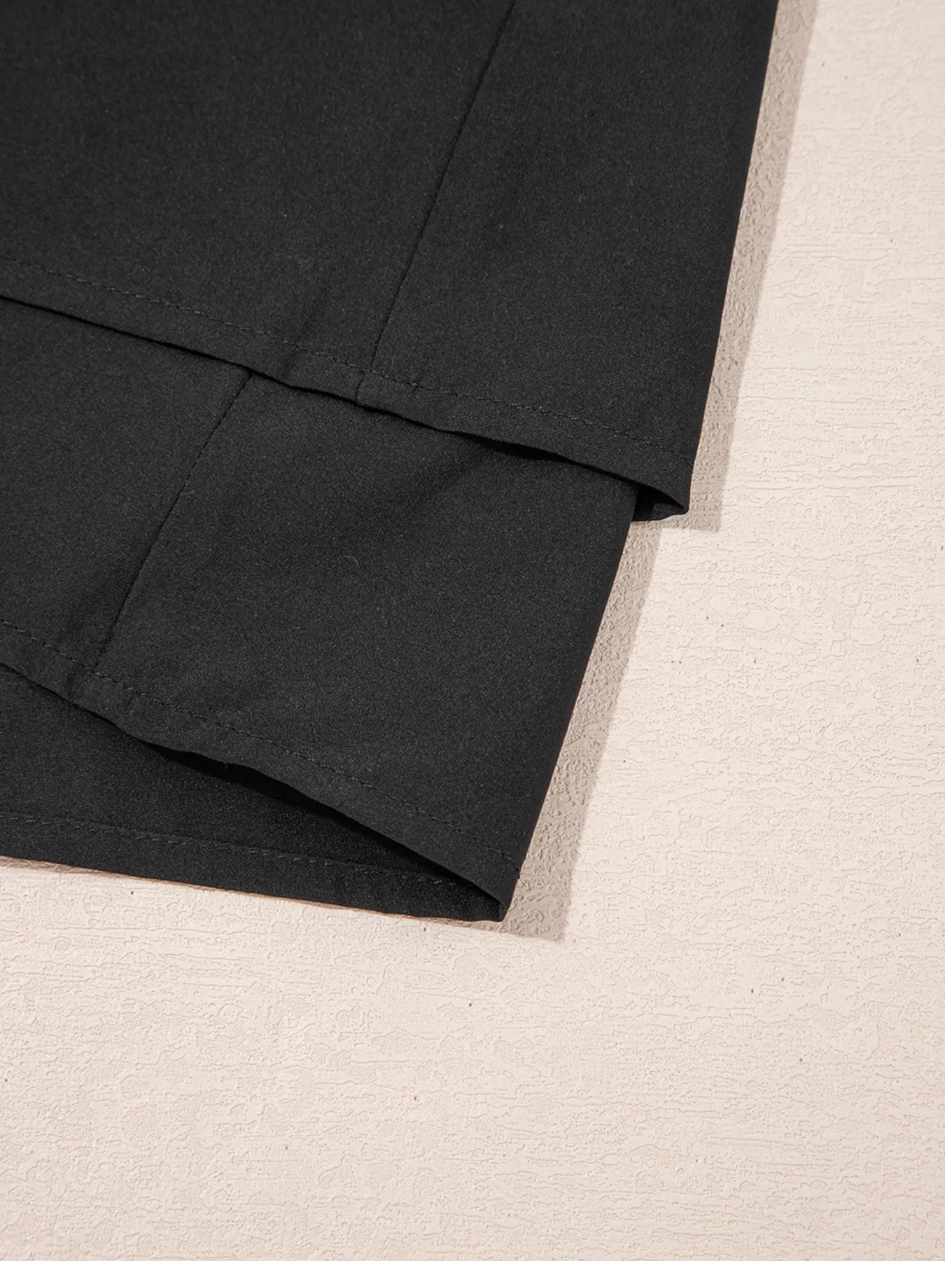 Elegant ruffle shorts perfect for formal occasions, combining style and comfort with a chic design.