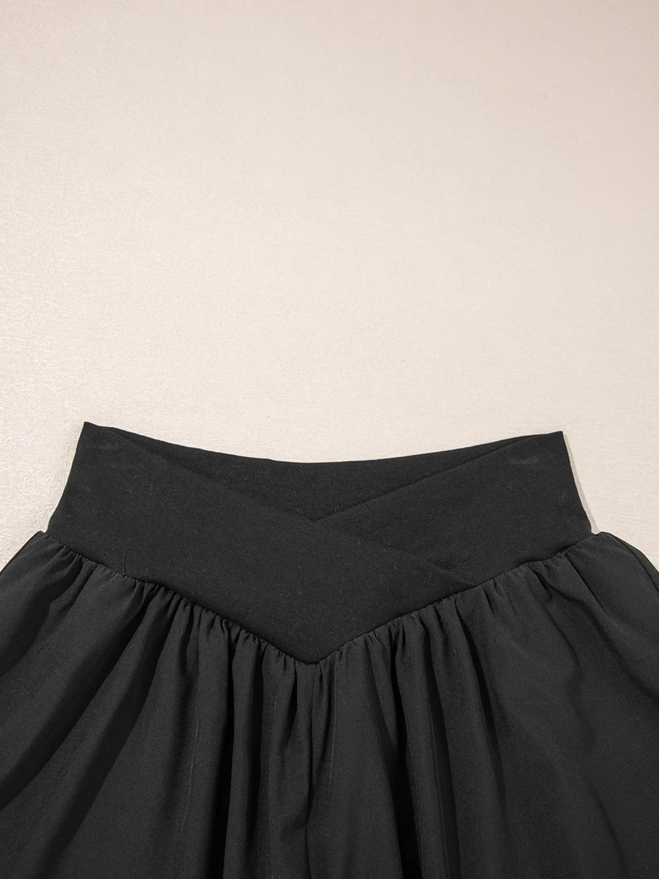 Elegant ruffle shorts perfect for formal occasions, combining style and comfort with a chic design.