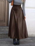 Elegant leather skirt showcasing premium craftsmanship, perfect for formal occasions and stylish wardrobes.