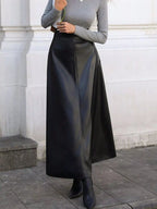 Elegant leather skirt showcasing premium craftsmanship, perfect for formal occasions and stylish wardrobes.