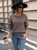 Perfee Cutout Round Neck Long Sleeve Sweater.