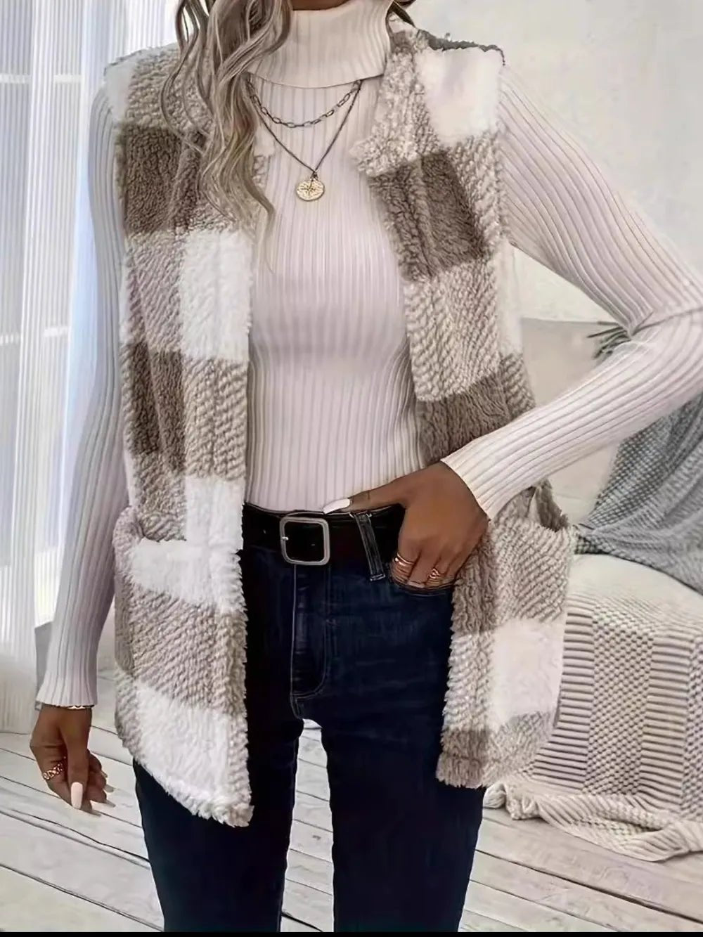 Plaid vest designed with classic patterns for stylish, sophisticated layering in formal and casual settings