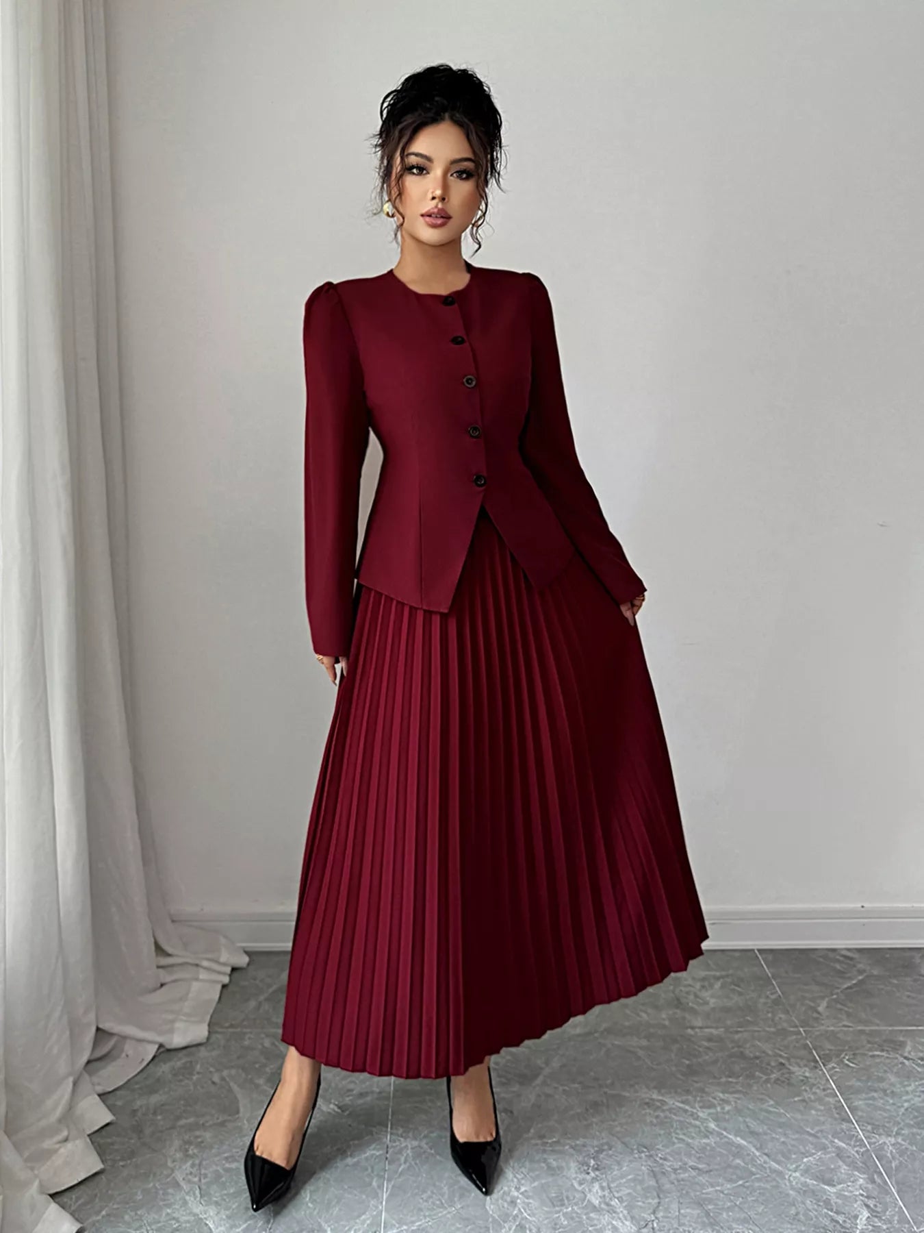 Elegant pleated midi skirt showcasing classic skirt design perfect for formal occasions and stylish outfits.