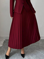 Elegant pleated midi skirt showcasing classic skirt design perfect for formal occasions and stylish outfits.
