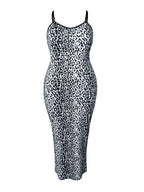 Elegant plus size leopard print maxi dress showcasing bold patterns and flattering silhouette for stylish occasions.