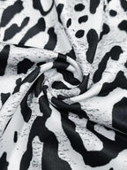 Elegant plus size leopard print maxi dress showcasing bold patterns and flattering silhouette for stylish occasions.