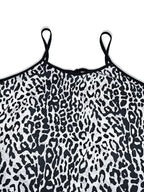 Elegant plus size leopard print maxi dress showcasing bold patterns and flattering silhouette for stylish occasions.