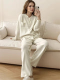 Pocketed Round Neck Button Up Cardigan and Pants Sweater Set.