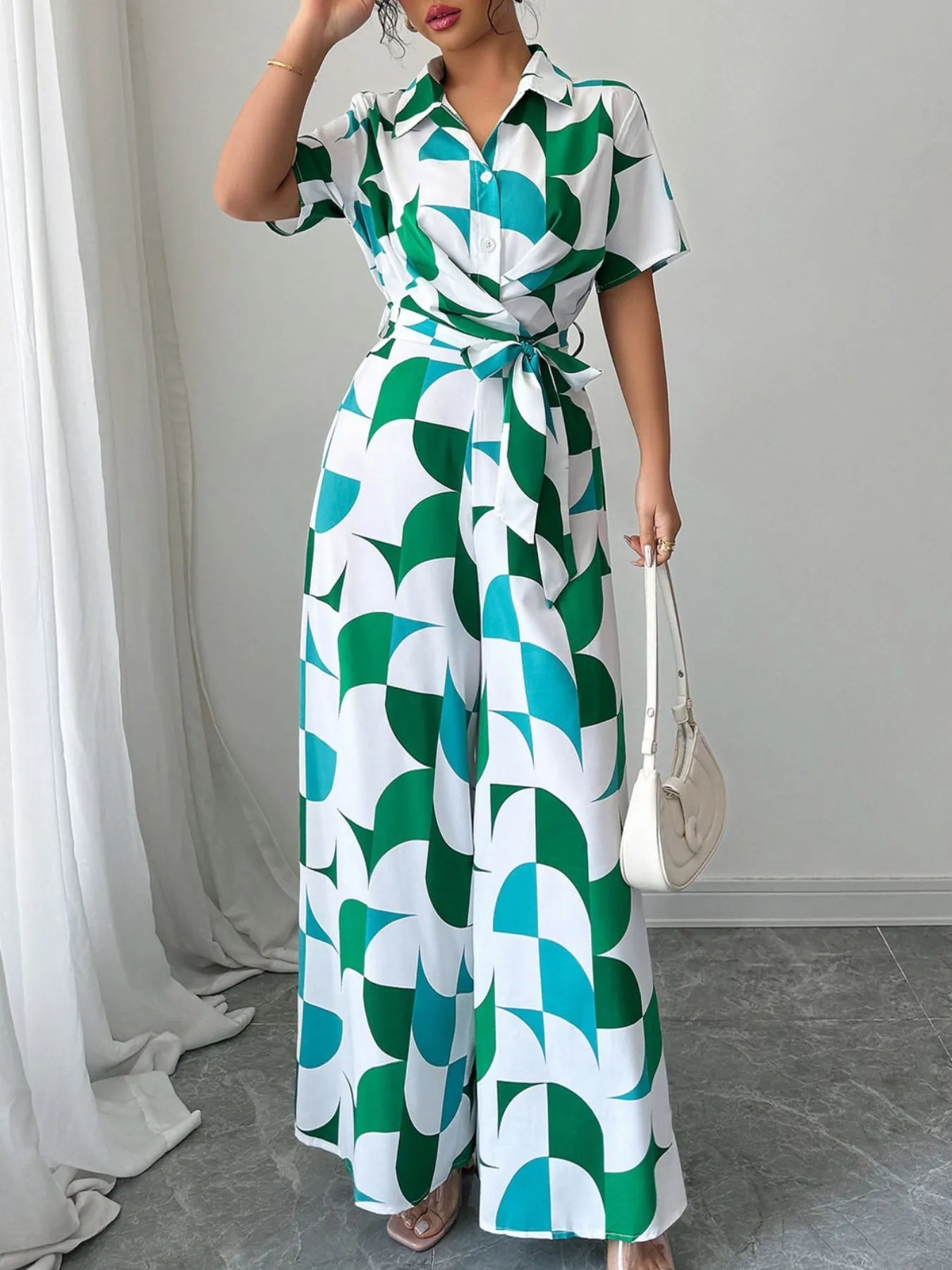 Printed Wide Leg Belted Jumpsuit.