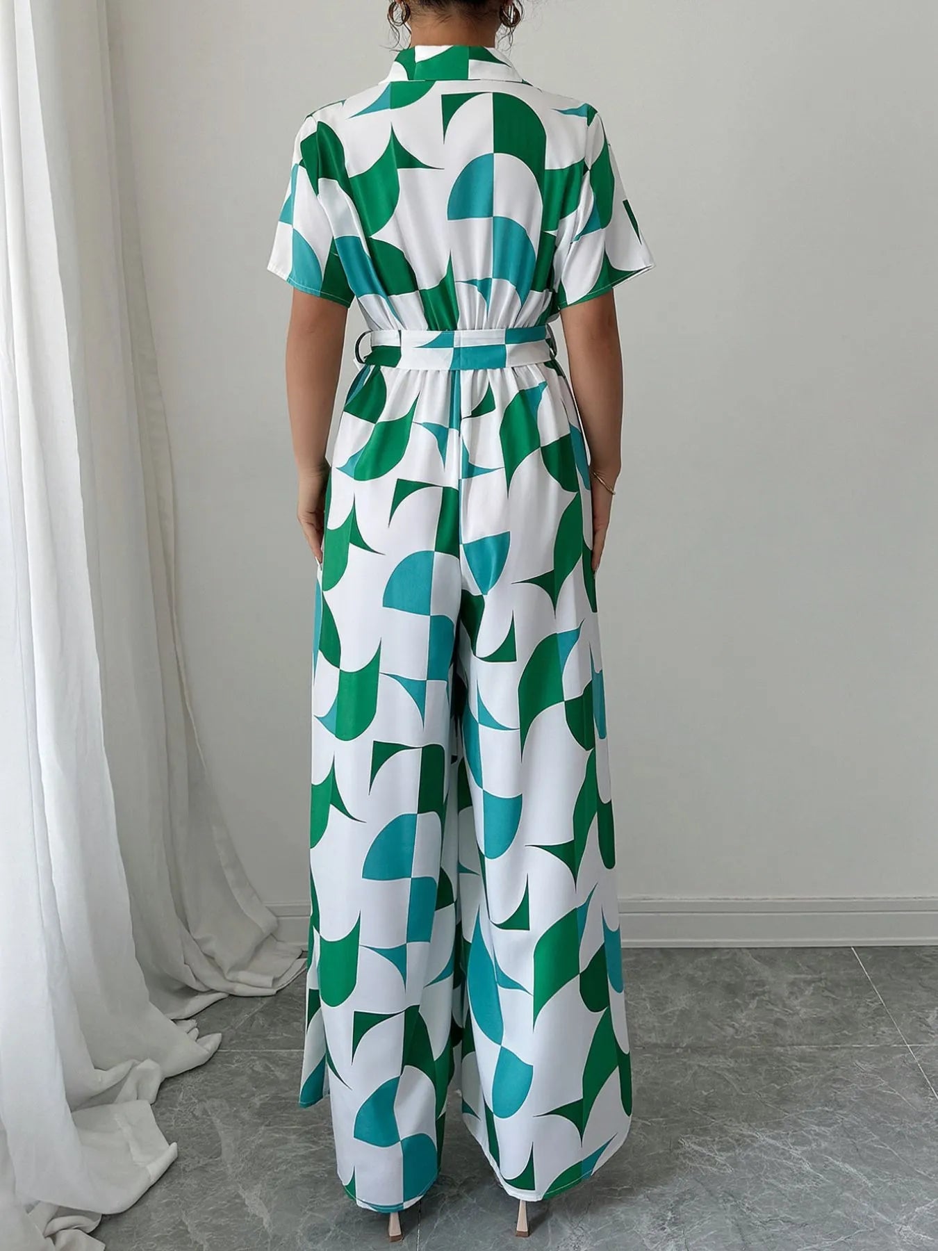 Printed Wide Leg Belted Jumpsuit.