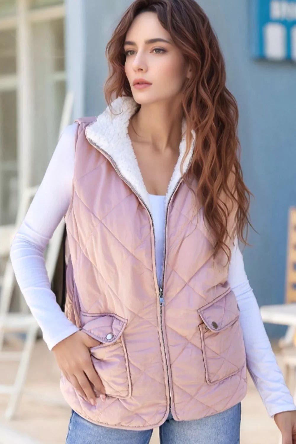 Quilted Sherpa-lined vest providing warmth and style, perfect for cold weather layering