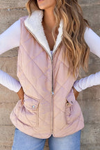 Quilted Sherpa-lined vest providing warmth and style, perfect for cold weather layering