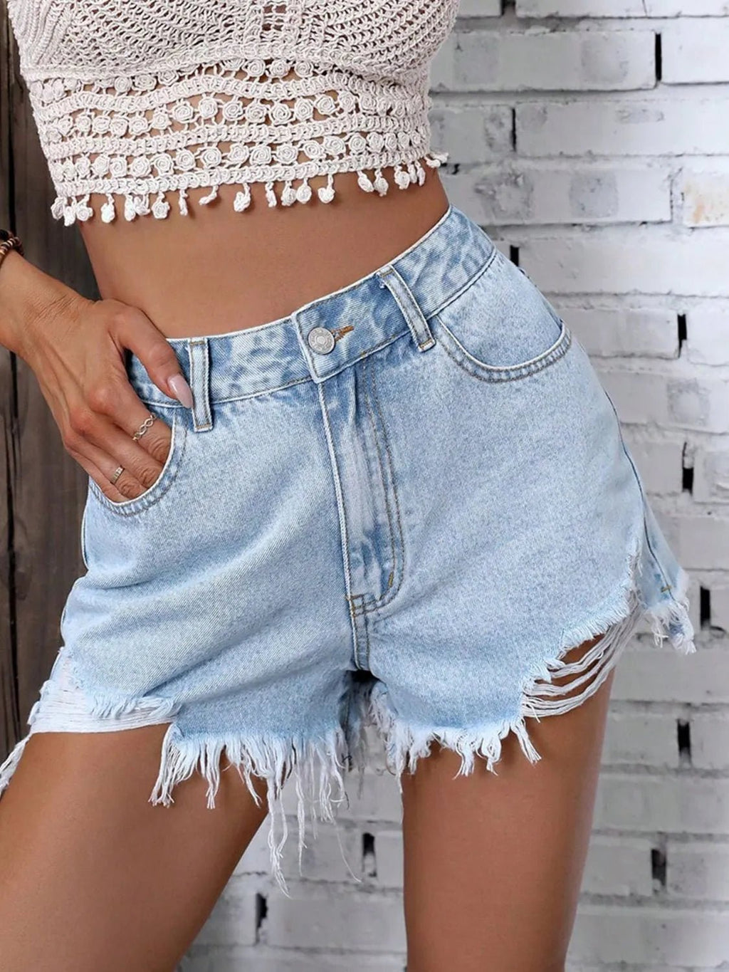Raw denim shorts showcasing classic denim shorts style for versatile summer fashion.