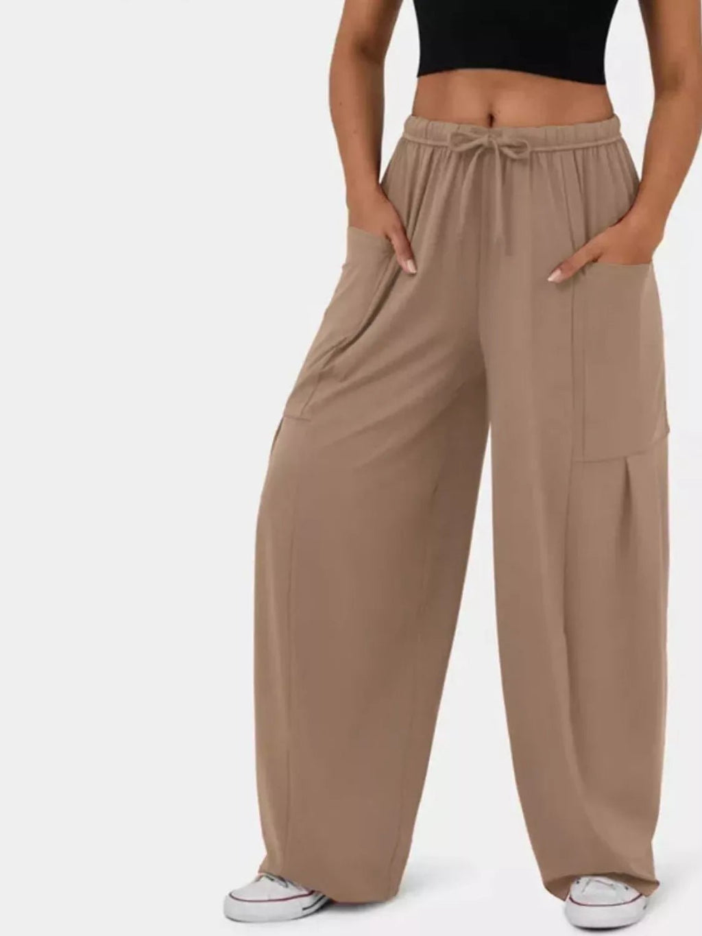 Relaxed fit drawstring pants offering comfort and style for casual and formal wear, ideal for everyday use.