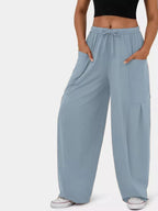 Relaxed fit drawstring pants offering comfort and style for casual and formal wear, ideal for everyday use.