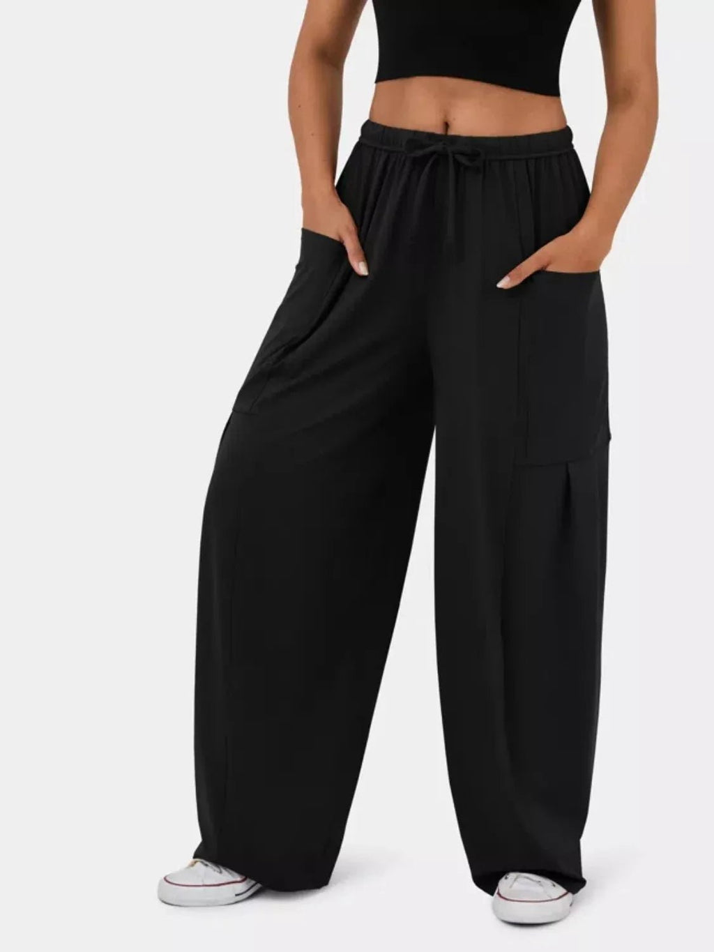 Relaxed fit drawstring pants offering comfort and style for casual and formal wear, ideal for everyday use.