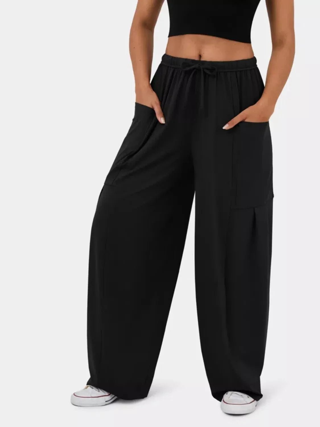 Relaxed fit drawstring pants offering comfort and style for casual and formal wear, ideal for everyday use.