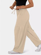 Relaxed fit drawstring pants offering comfort and style for casual and formal wear, ideal for everyday use.