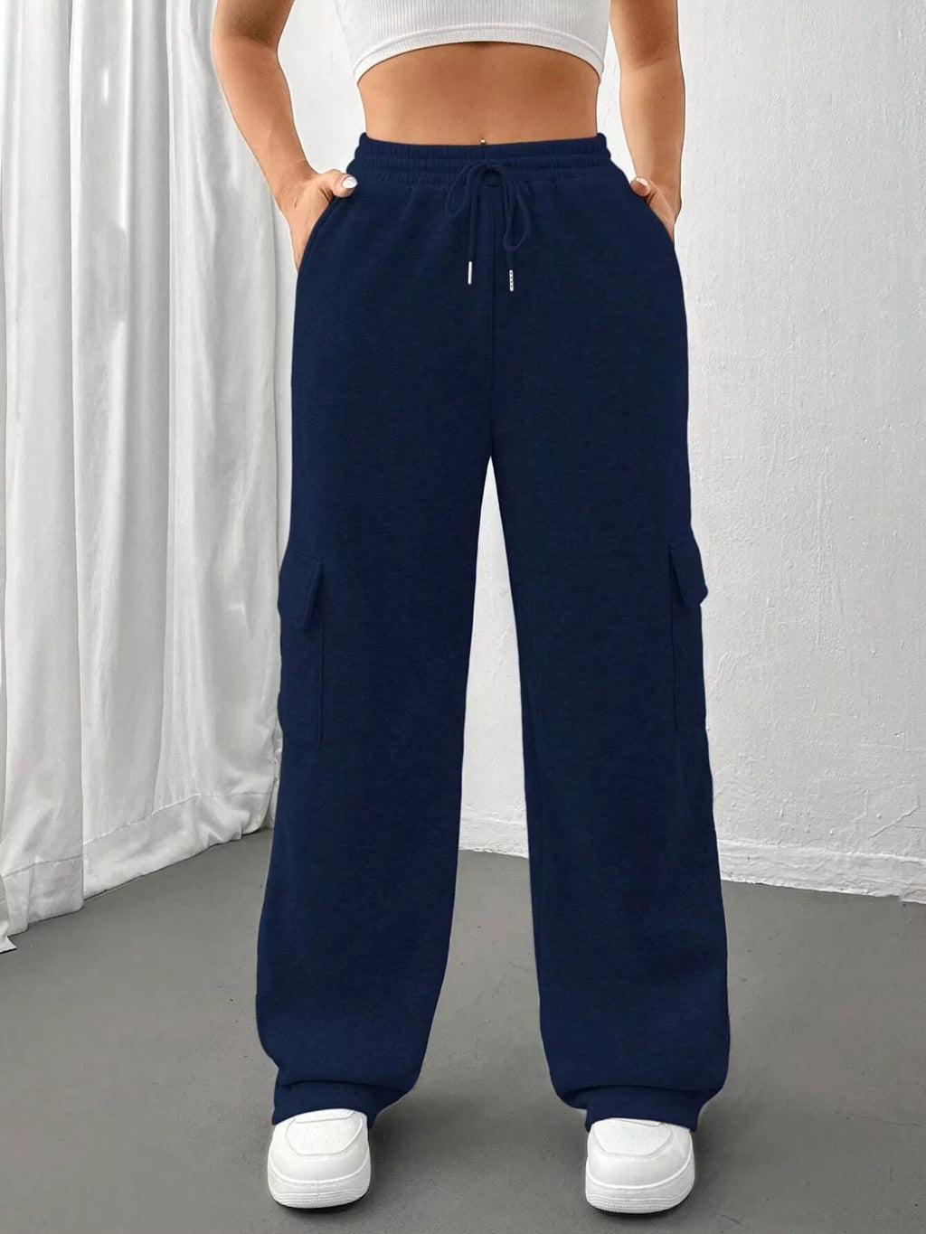 Comfortable relaxed fit pants featuring a drawstring waist for adjustable and stylish wear