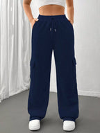 Comfortable relaxed fit pants featuring a drawstring waist for adjustable and stylish wear
