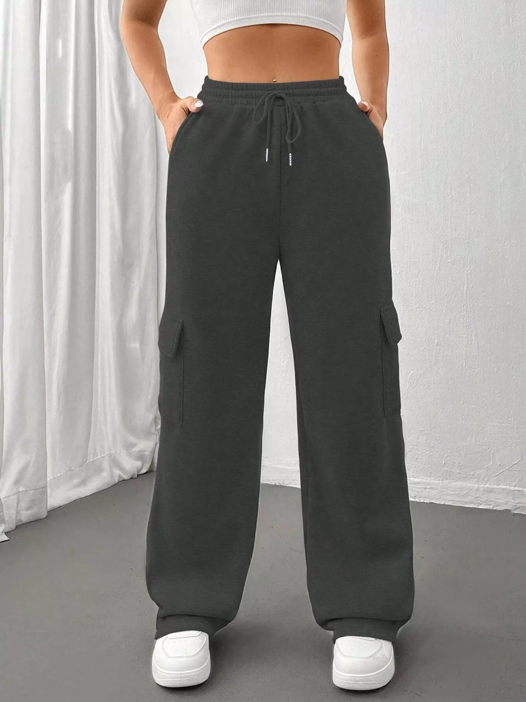 Comfortable relaxed fit pants featuring a drawstring waist for adjustable and stylish wear