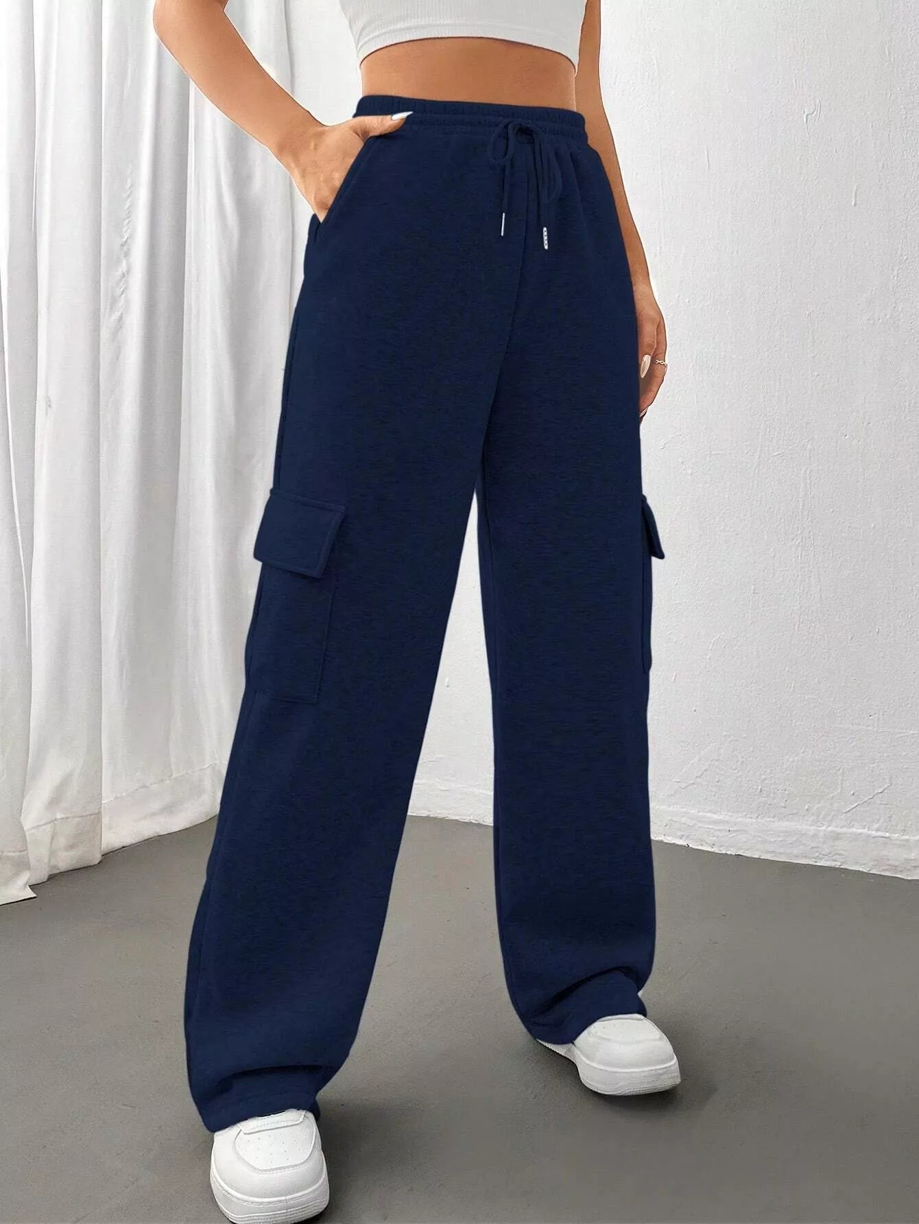 Comfortable relaxed fit pants featuring a drawstring waist for adjustable and stylish wear