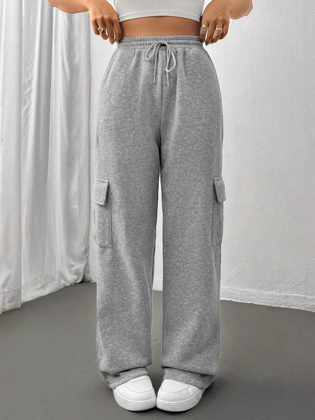 Comfortable relaxed fit pants featuring a drawstring waist for adjustable and stylish wear