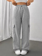 Comfortable relaxed fit pants featuring a drawstring waist for adjustable and stylish wear