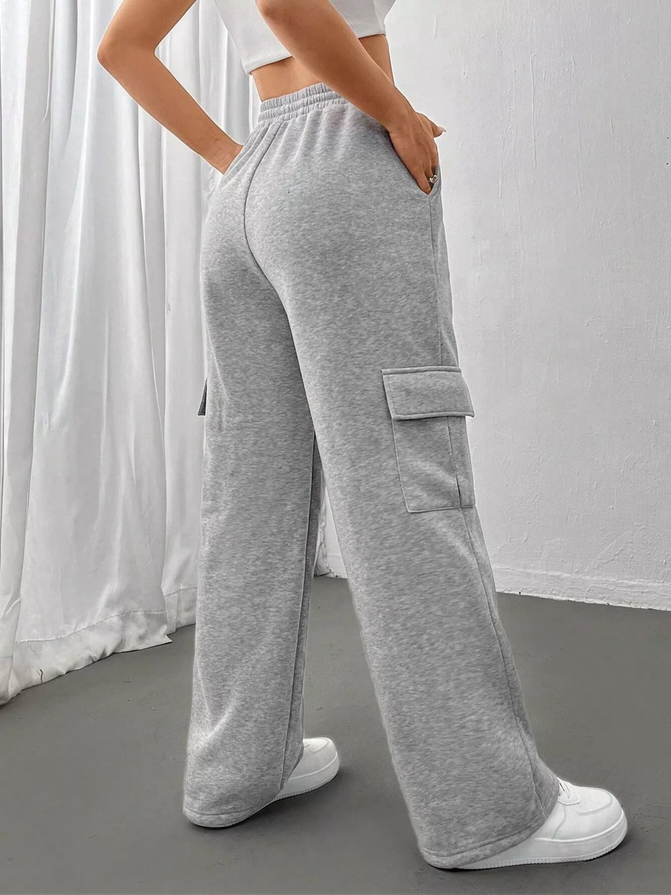 Comfortable relaxed fit pants featuring a drawstring waist for adjustable and stylish wear