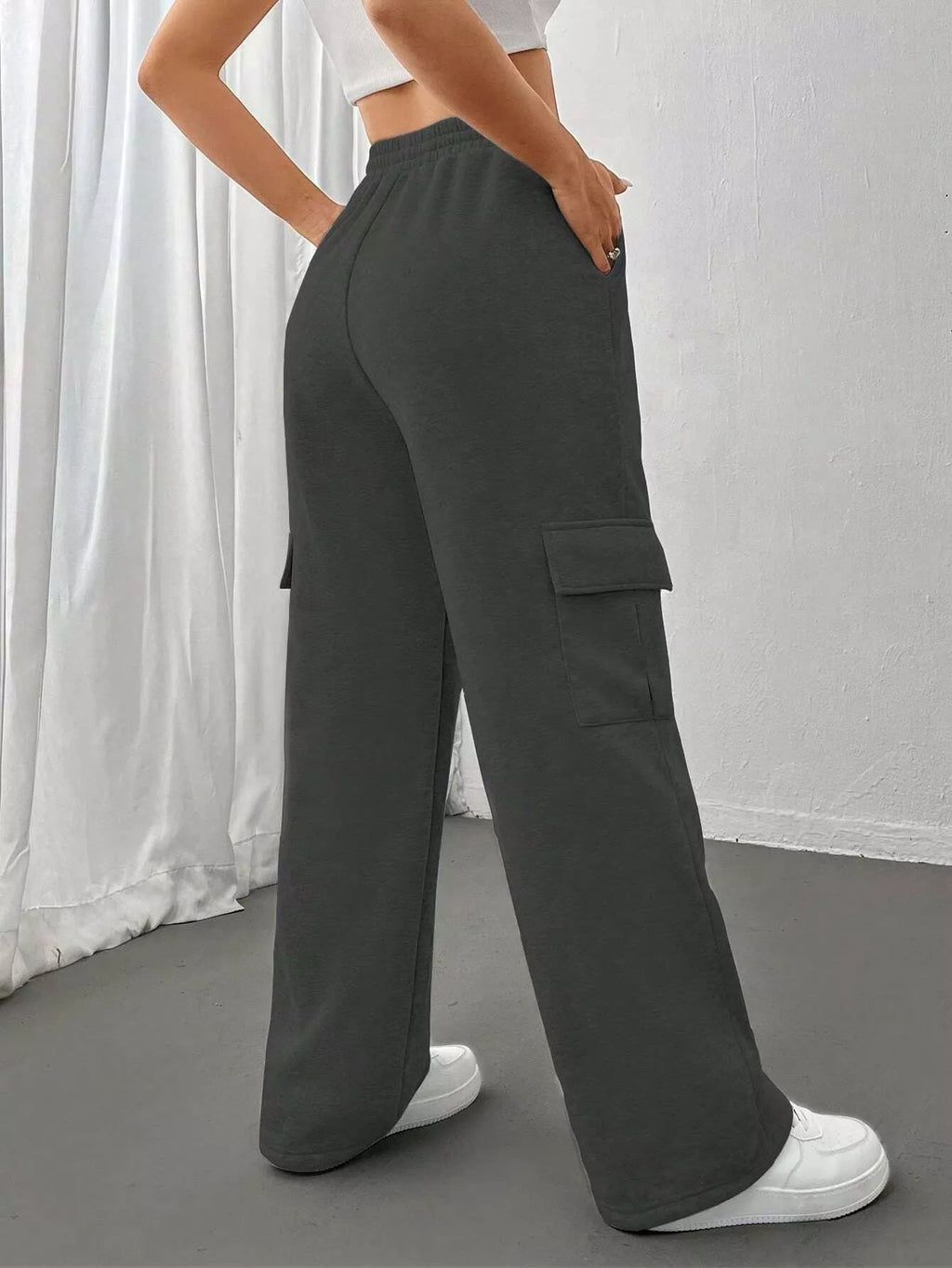 Comfortable relaxed fit pants featuring a drawstring waist for adjustable and stylish wear