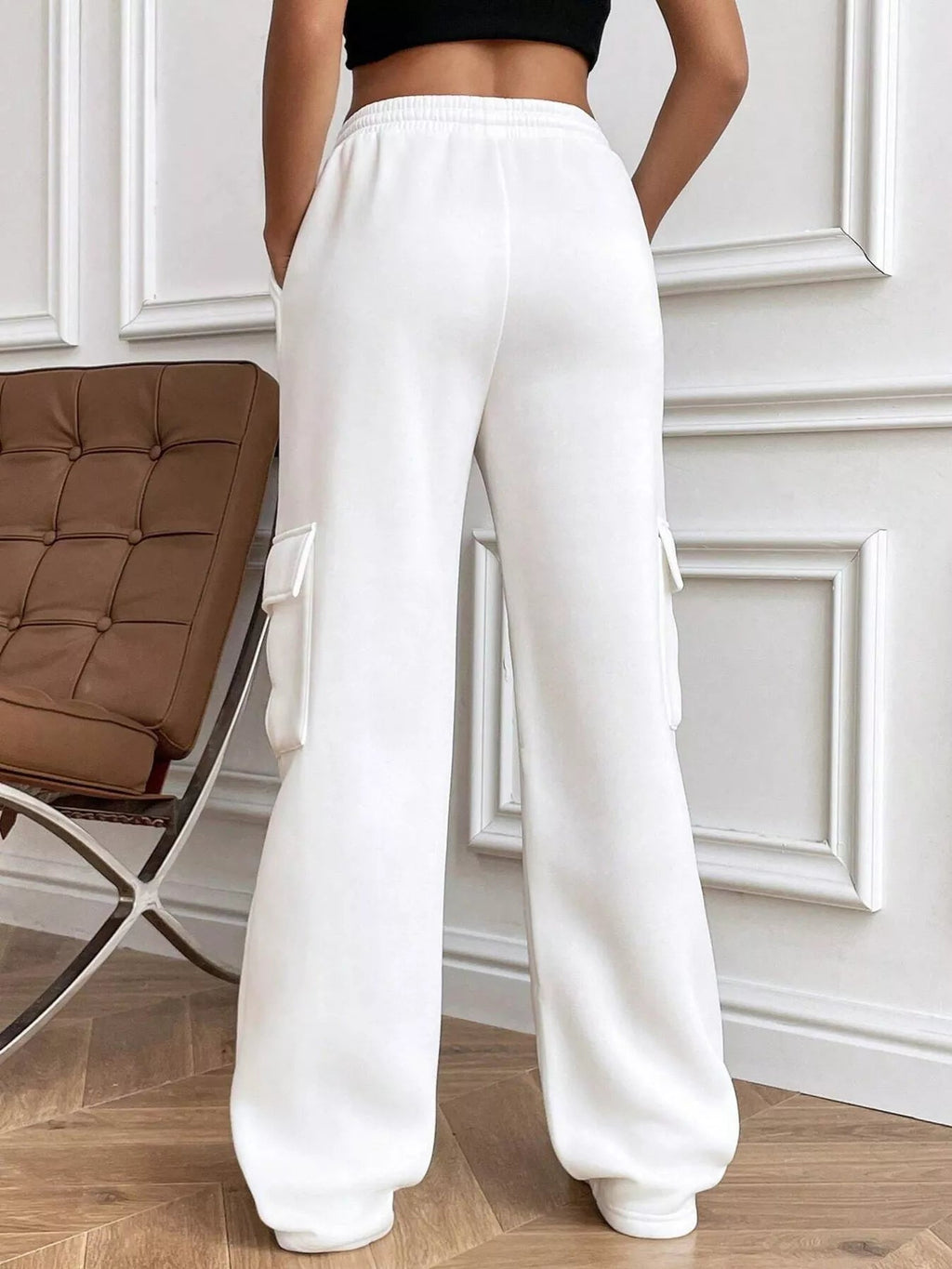 Comfortable relaxed fit pants featuring a drawstring waist for adjustable and stylish wear