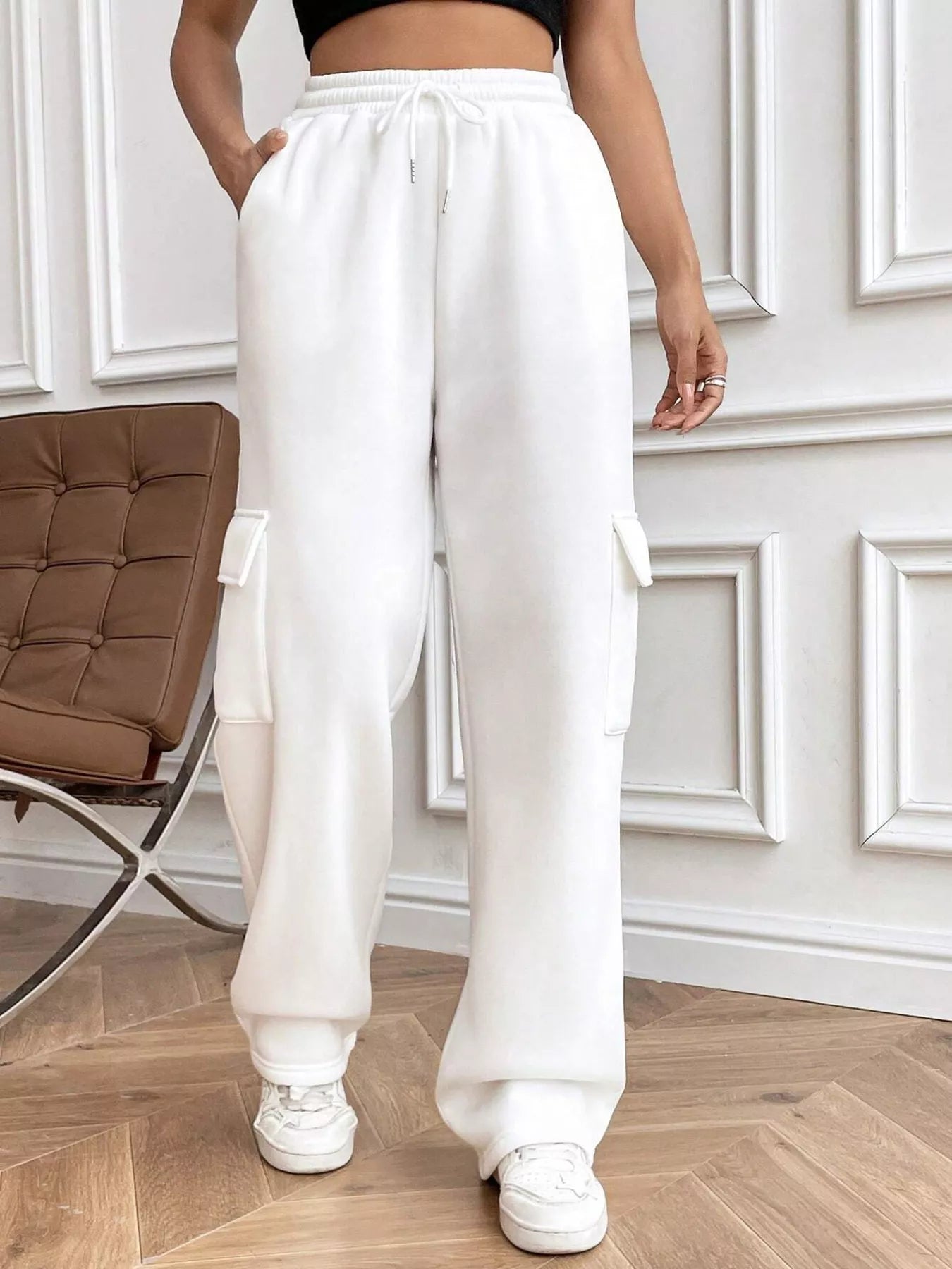 Comfortable relaxed fit pants featuring a drawstring waist for adjustable and stylish wear