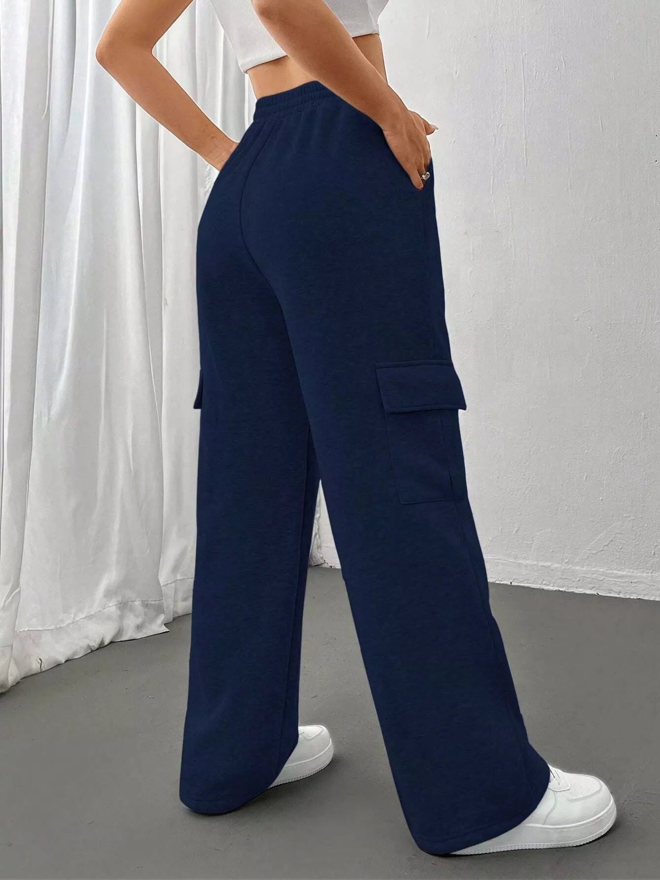 Comfortable relaxed fit pants featuring a drawstring waist for adjustable and stylish wear