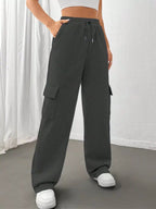 Comfortable relaxed fit pants featuring a drawstring waist for adjustable and stylish wear
