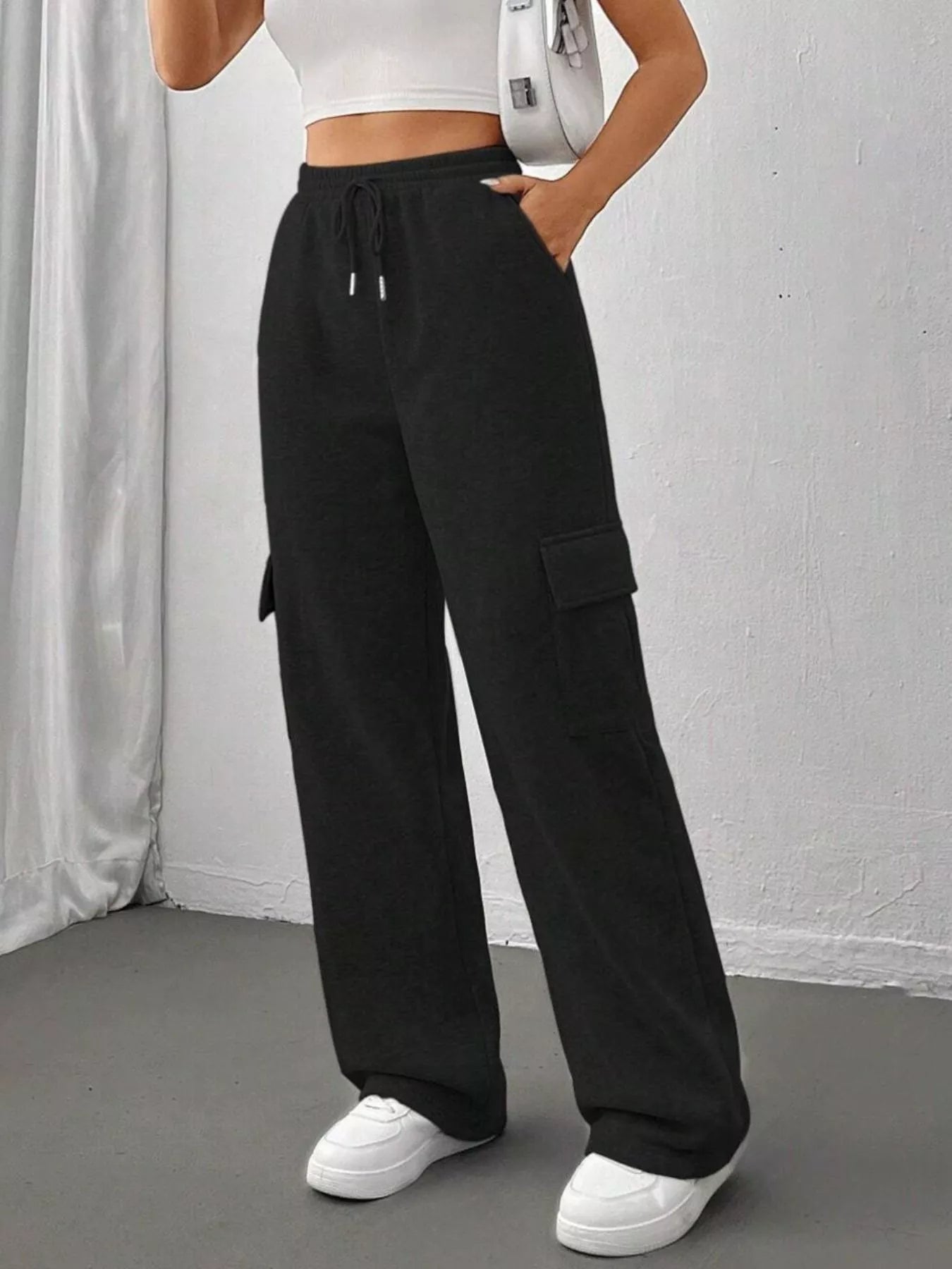 Comfortable relaxed fit pants featuring a drawstring waist for adjustable and stylish wear