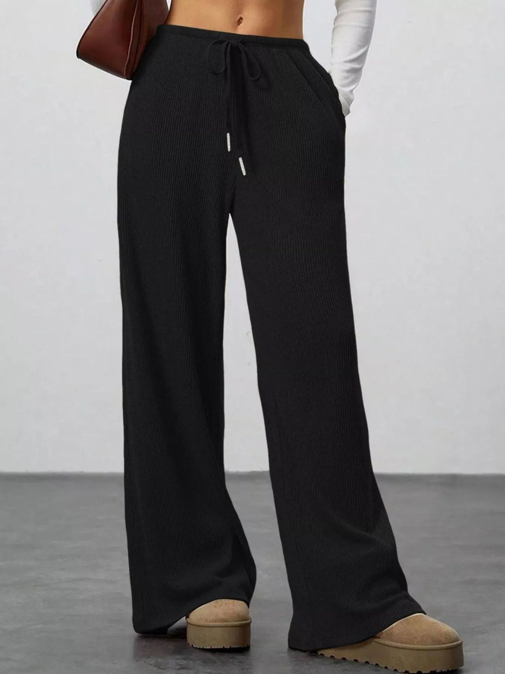 Relaxed fit wide leg pants offering comfort and style for a modern wardrobe.