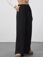 Relaxed fit wide leg pants offering comfort and style for a modern wardrobe.