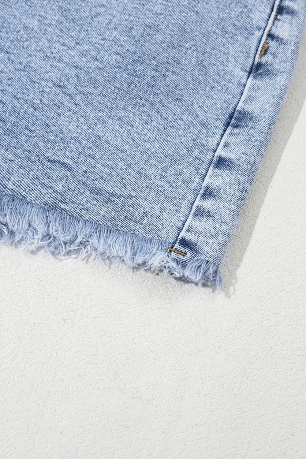 Stylish high waist denim shorts for modern casual wear, perfect for summer fashion and outdoor activities.