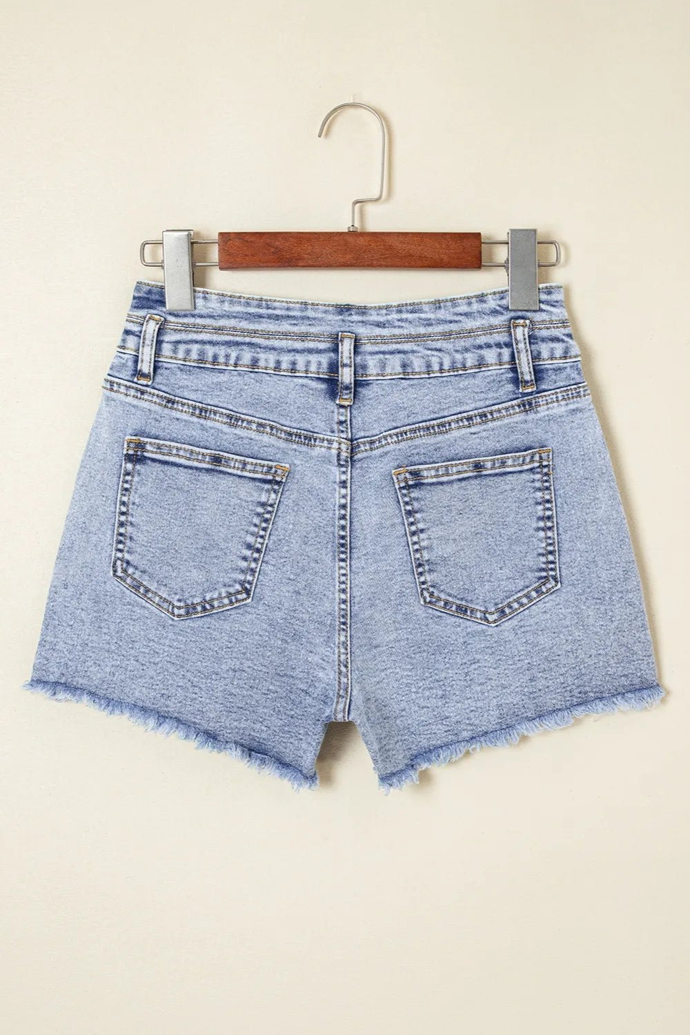 Stylish high waist denim shorts for modern casual wear, perfect for summer fashion and outdoor activities.