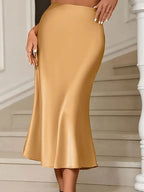 Elegant satin midi skirt showcasing sophisticated design and luxurious fabric for formal occasions