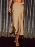 Elegant satin midi skirt showcasing smooth texture and versatile style in fashionable women's wardrobe