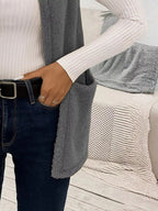 Warm sleeveless fleece vest ideal for layering, offering comfort and versatility in cold weather.