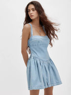 Smocked Crisscross Back Denim Mini Dress.