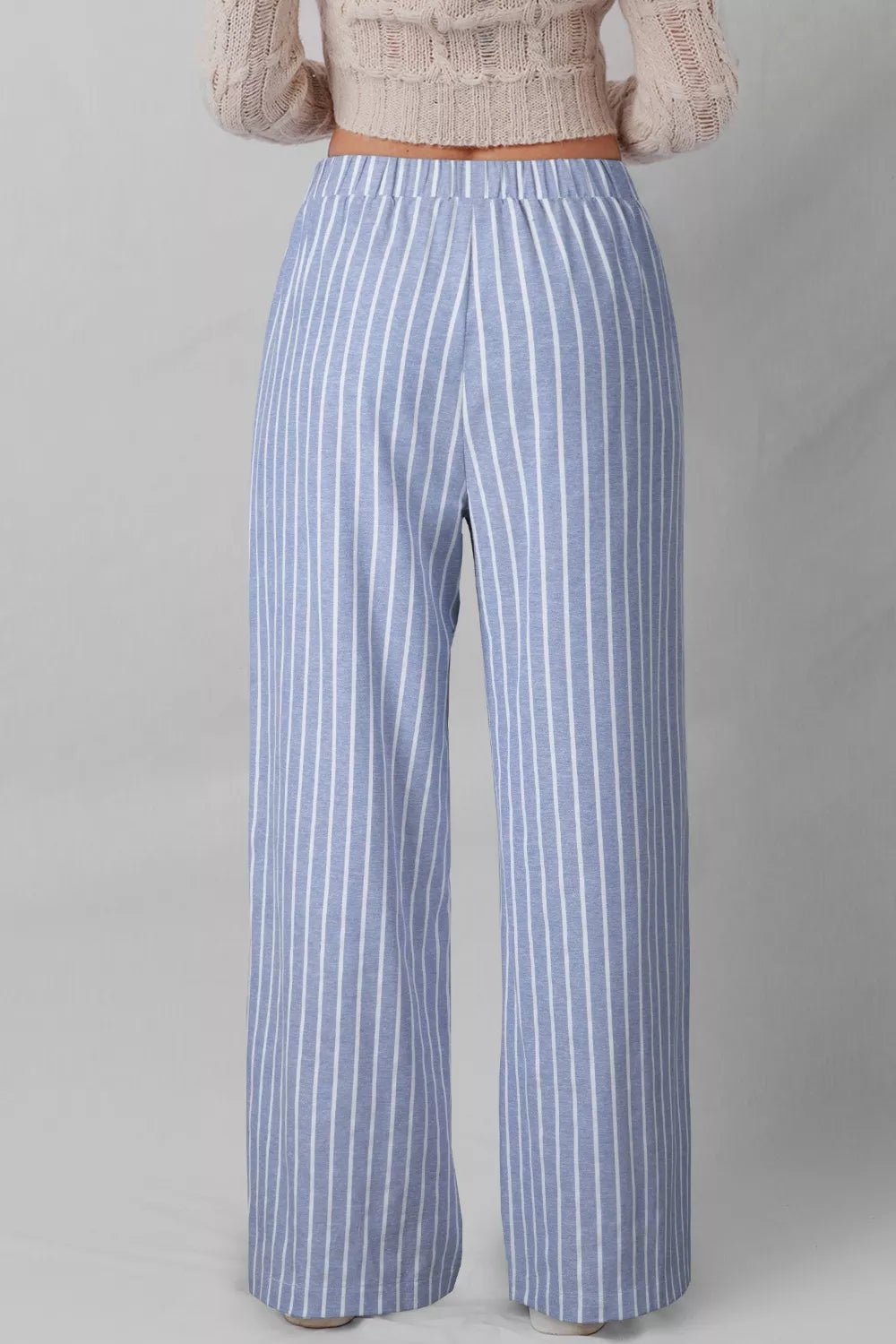 Stylish casual elegance with classic stripe patterns for a refined and timeless look in fashion.