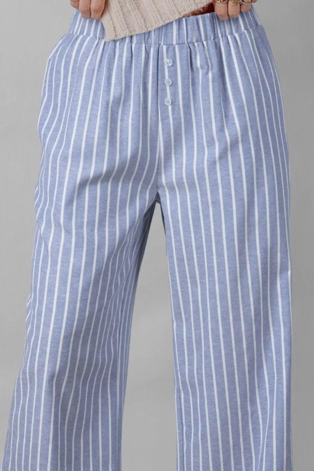 Stylish casual elegance with classic stripe patterns for a refined and timeless look in fashion.