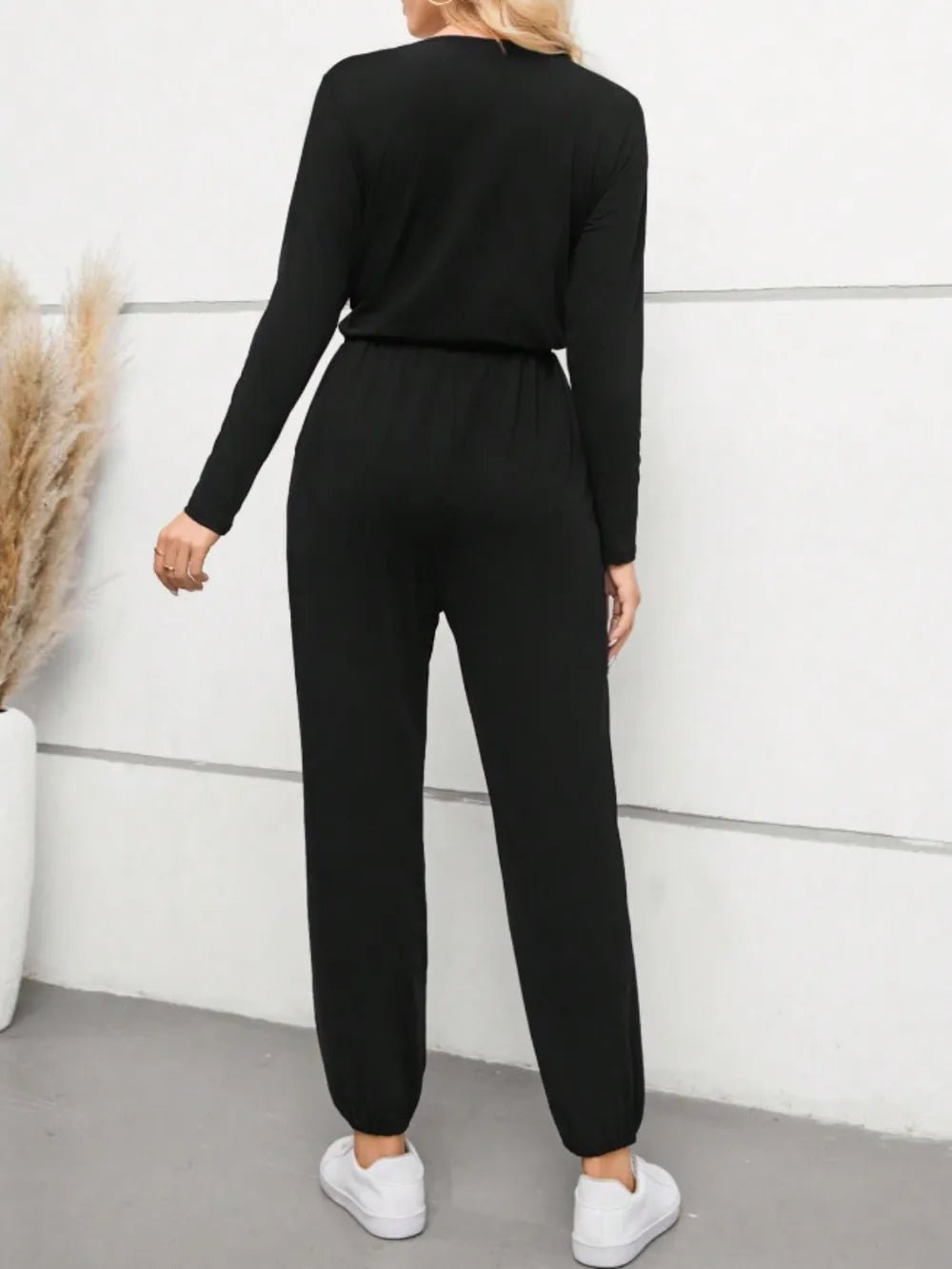 Surplice Tie Waist Long Sleeve Jumpsuit.