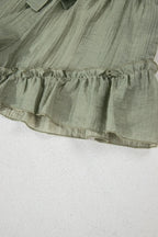 Tie waist shorts with elegant ruffle hem detail, perfect for a stylish and comfortable summer outfit.