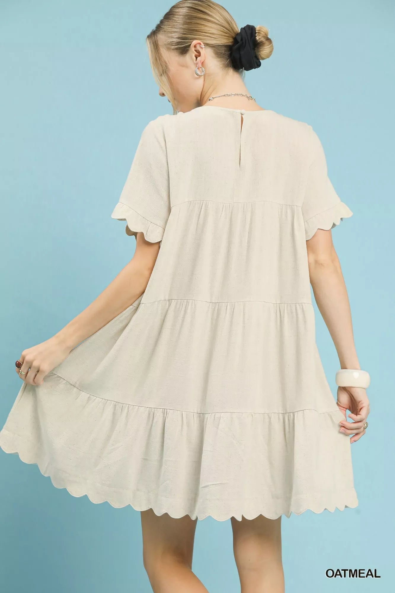 Umgee Linen Tiered Babydoll Dress with Ruffle Sleeves.