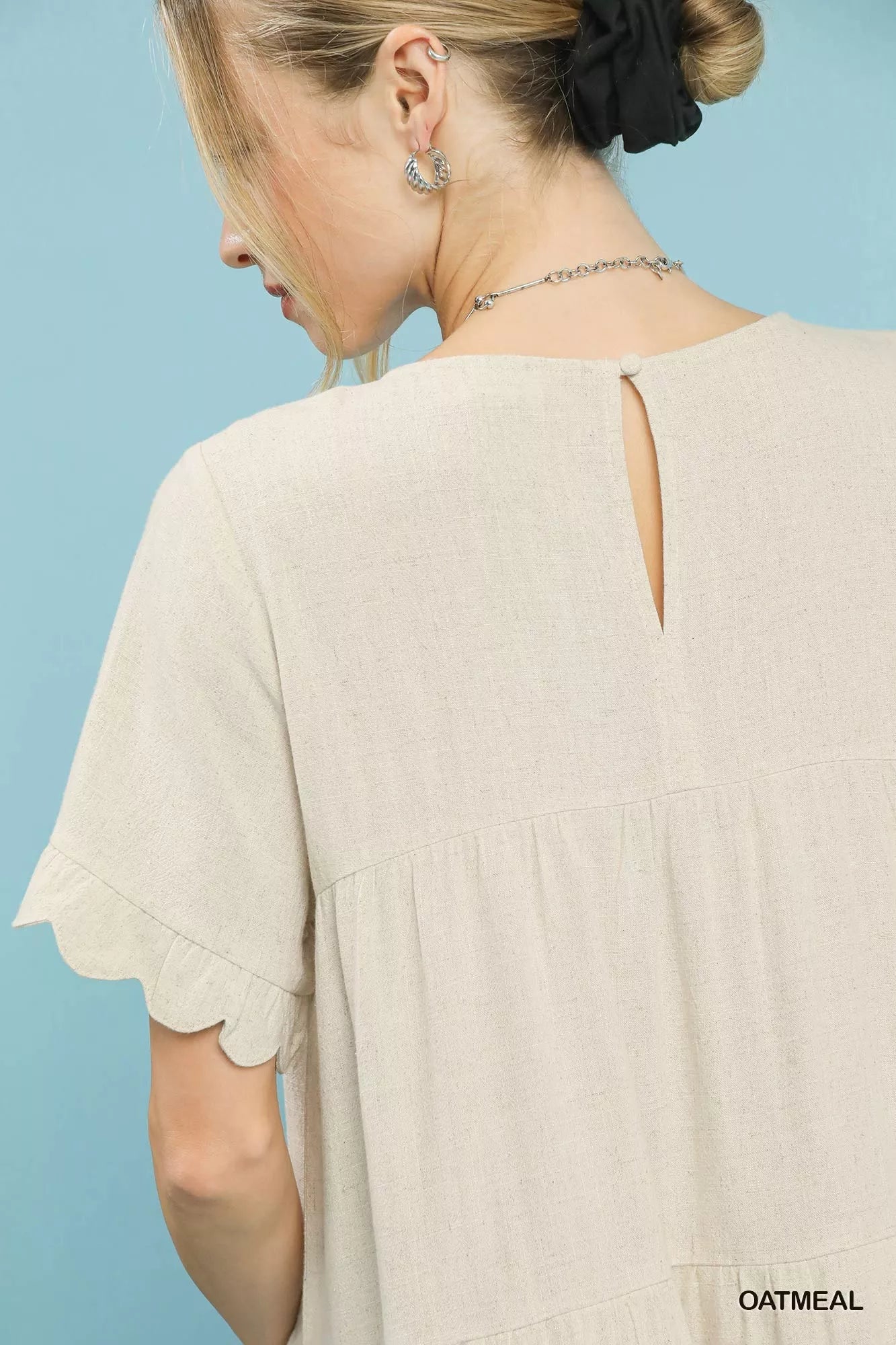 Umgee Linen Tiered Babydoll Dress with Ruffle Sleeves.