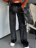 Elegant velvet wide leg pants offering comfort and style for formal occasions.
